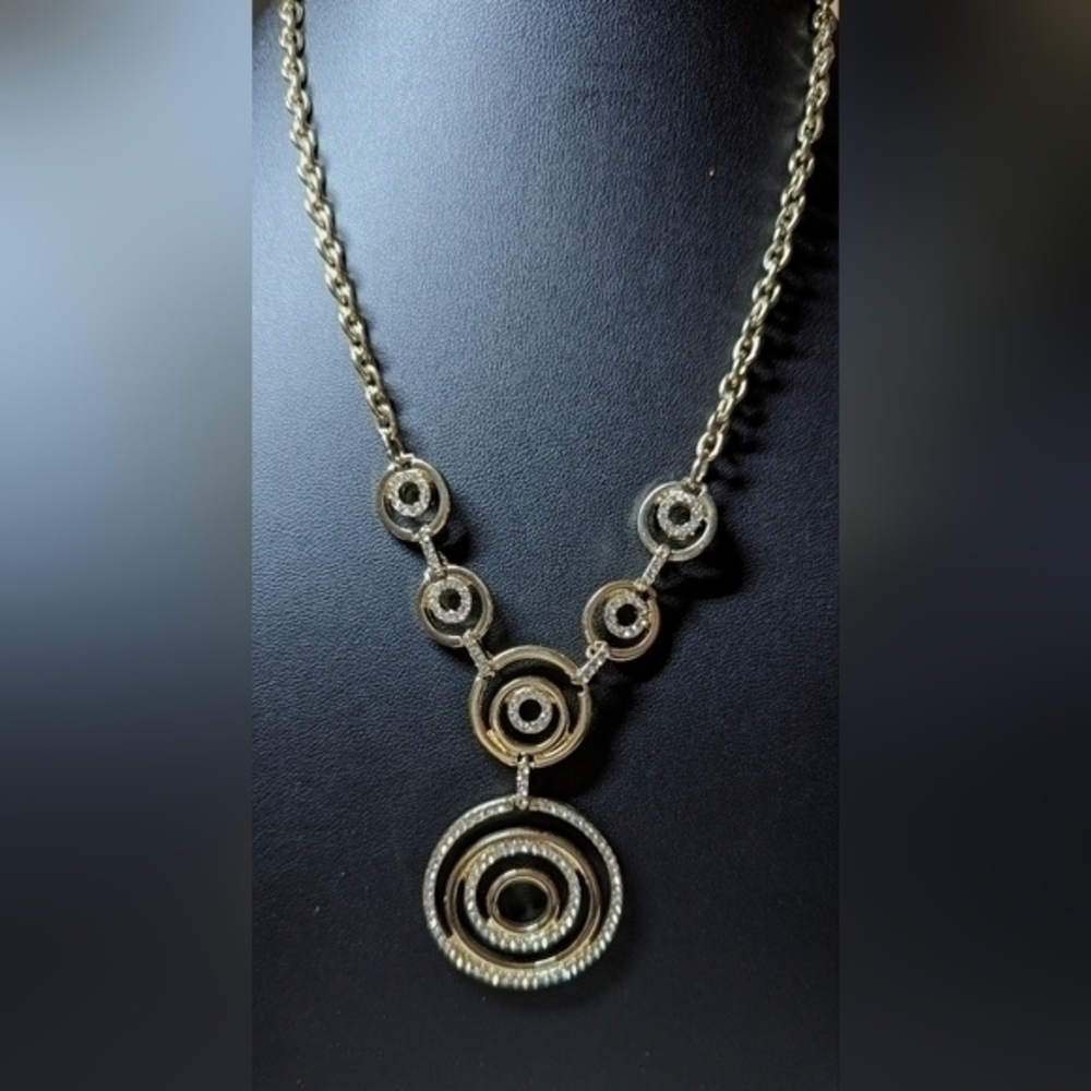 A Macy's sparkling crystal and golden necklace NWT.